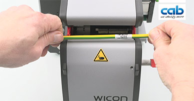 Applicateur d'étiquettes sur produits cylindriques WICON